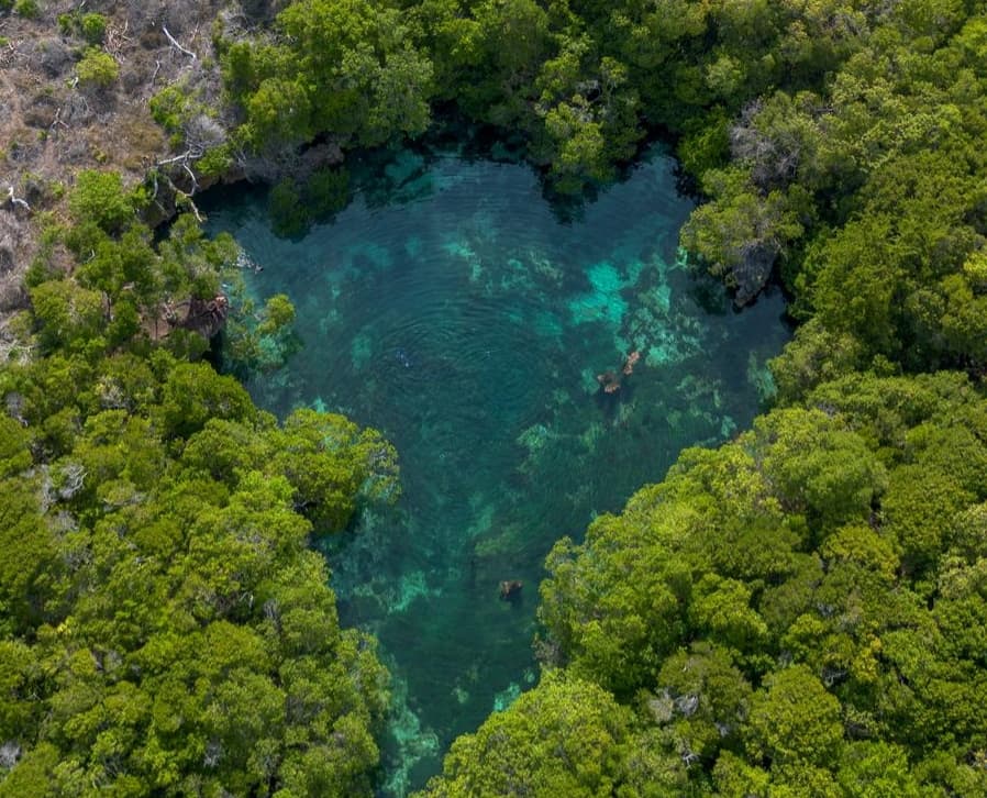 Aerial view of turquoise lagoon waters